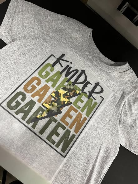 Vibrant screen printed t-shirt with multi-color design and sharp details